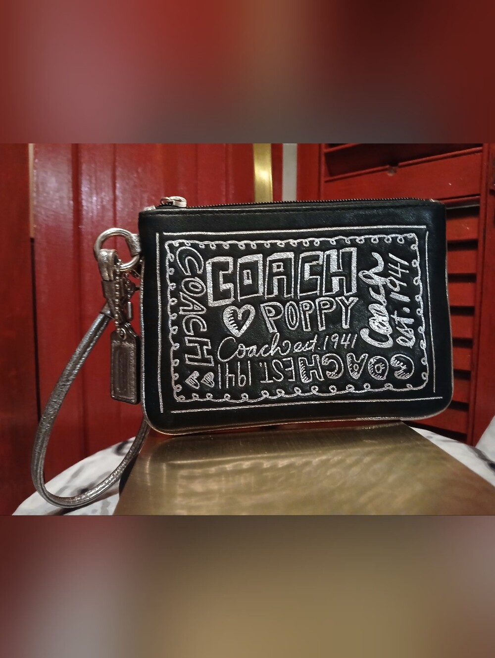 COACH Black Poppy Signature Wristlet